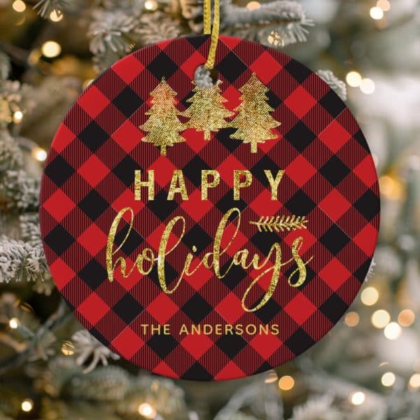 Round Red And Black Buffalo Plaid Christmas Ornament With Gold Glitter Happy Holidays Text And Three Gold Glitter Christmas Trees, Personalized With The Andersons.