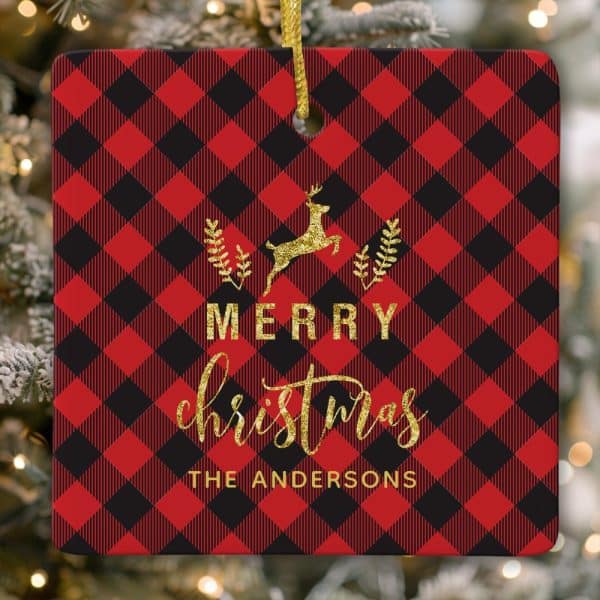 Red And Black Buffalo Plaid Christmas Ornament With A Gold Leaping Reindeer And Merry Christmas Text. The Andersons Family Name Is Also Included.