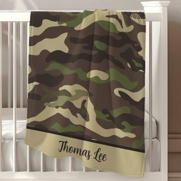 Personalized Camo Baby Blanket With Thomas Lee Embroidered On The Bottom.