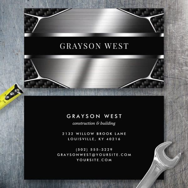 Business Card For Grayson West Construction, Featuring A Metallic Silver And Black Design.