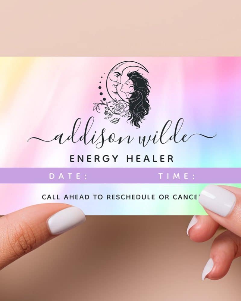 Appointment card for energy healer Addison Wilde. The card features a logo of a woman and moon.