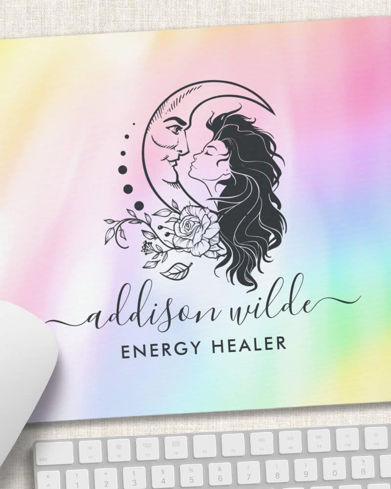 Mousepad featuring a crescent moon design with a woman's face and floral details; the text Addison Wilde Energy Healer is below.