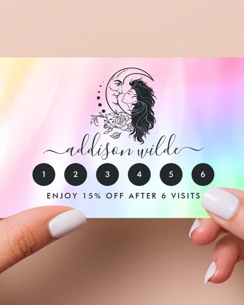 A pastel rainbow loyalty card featuring a moon and woman design; six visit spaces with a 15% off reward after six visits.