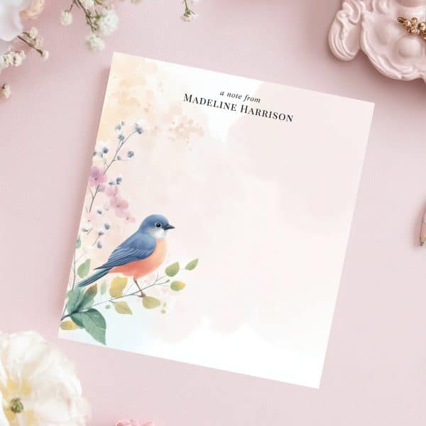 Stationery Featuring A Blue Bird Perched On A Flowering Branch.
