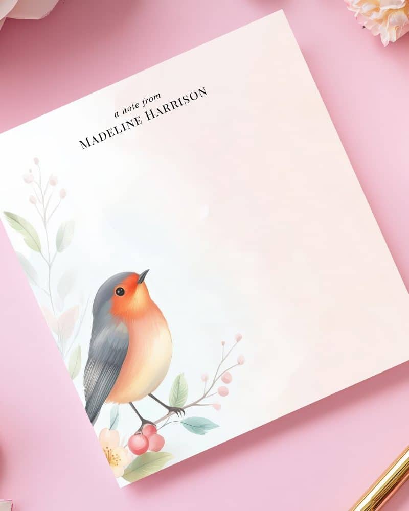 Personalized stationery featuring a robin perched on a flowering branch.