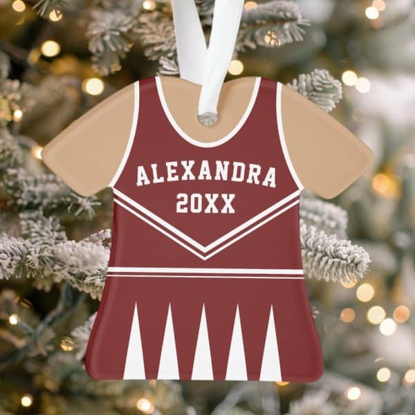 A Maroon And Tan Cheerleader Uniform-Shaped Christmas Ornament With The Name Alexandra And The Year 20Xx.