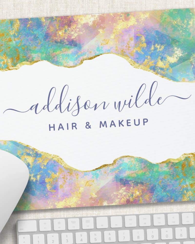 Mousepad with pastel and gold design, featuring the name Addison Wilde Hair & Makeup.