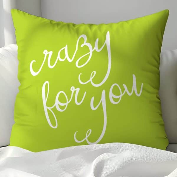 Lime Green Pillow With The Words Crazy For You In White Script.