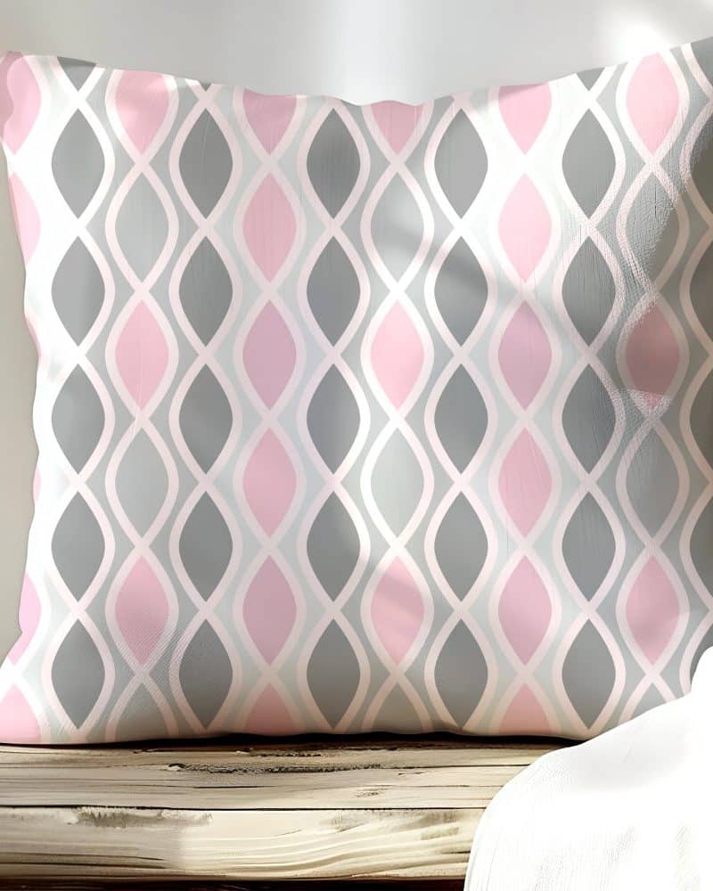 Pink and gray patterned throw pillow.