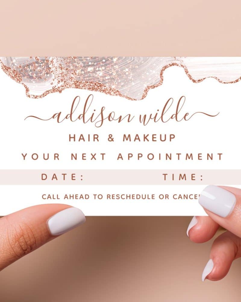 Appointment reminder card for Addison Wilde Hair & Makeup, featuring a rose gold and grey marble design.