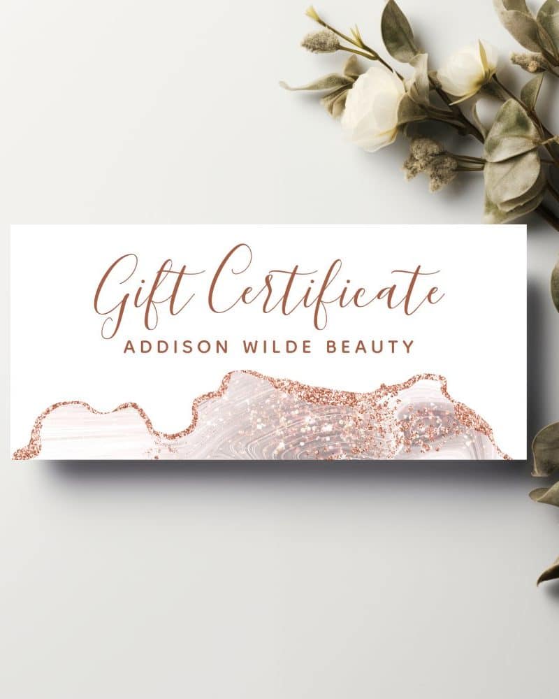 Rose gold gift certificate for Addison Wilde Beauty with a glitter design.