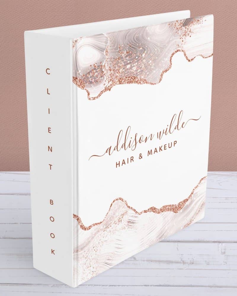 White client book with rose gold lettering and design; Addison Wilde Hair & Makeup.