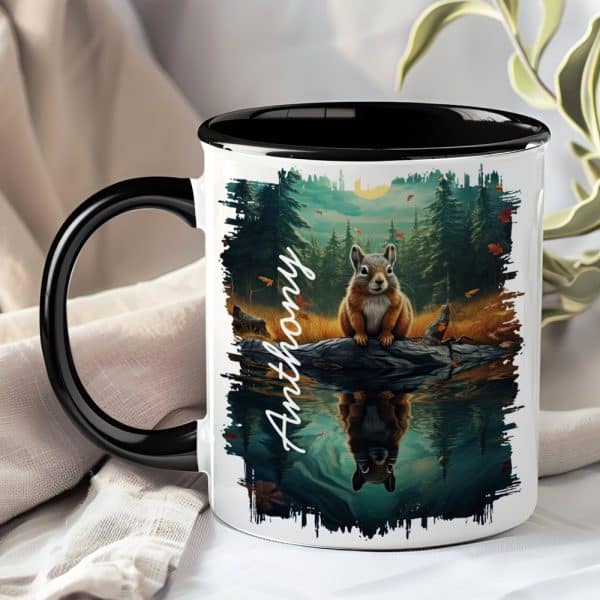 Black-Handled Mug With A Personalized Name, Anthony, And A Squirrel Sitting On A Log Reflected In Water, Set Against A Forest Backdrop.