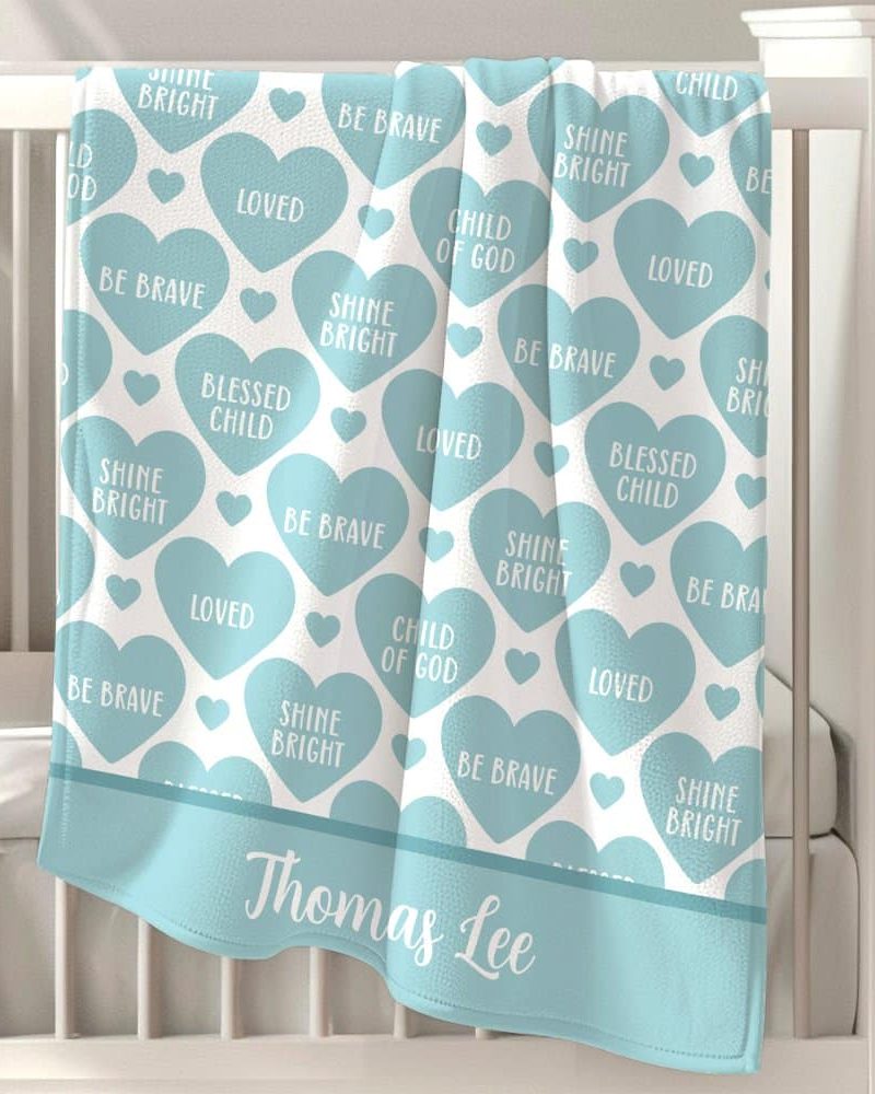 Personalized baby blanket with light blue hearts and encouraging phrases.
