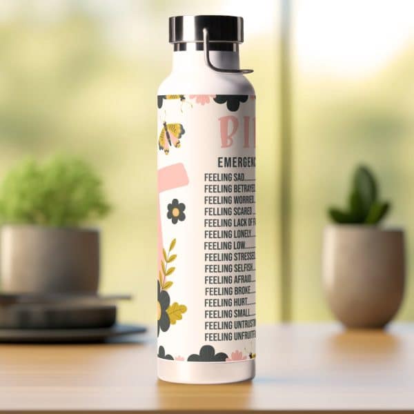 White Water Bottle With Floral Design And Text Listing Various Negative Feelings.