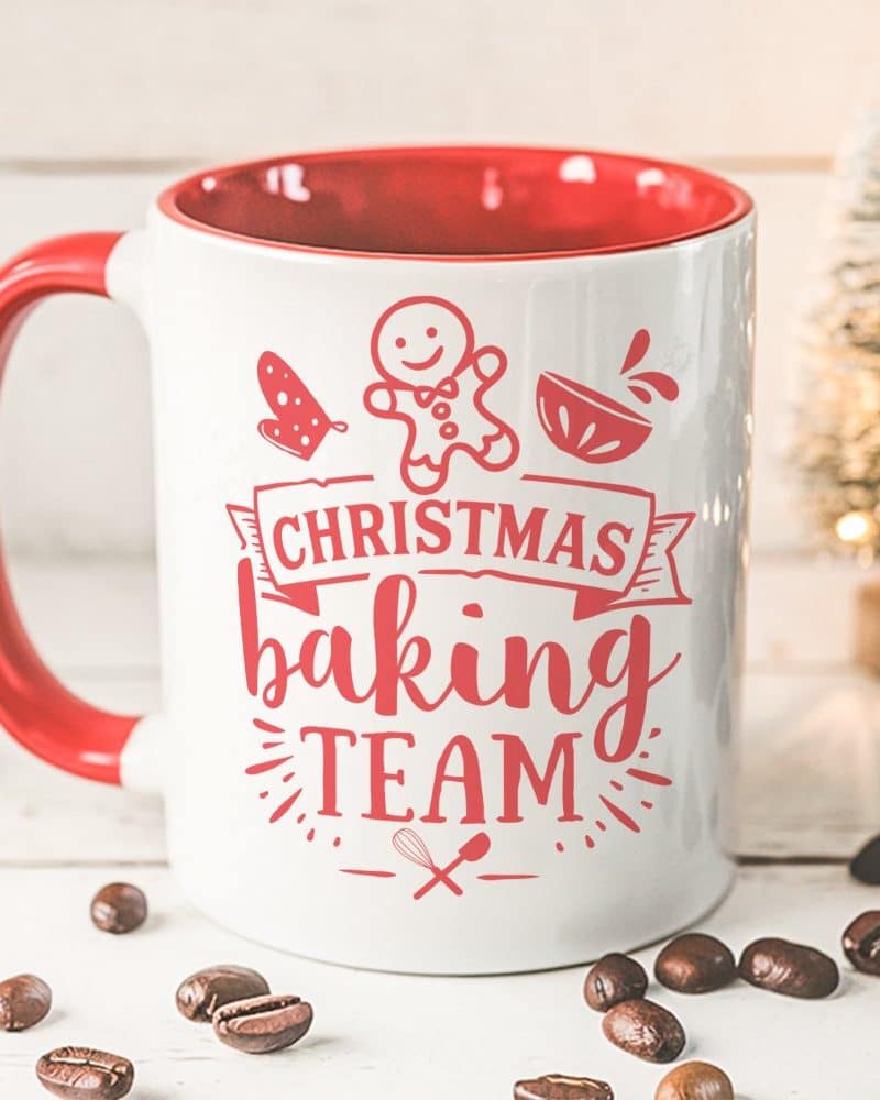 Red and white Christmas mug with the words Christmas Baking Team and festive images.