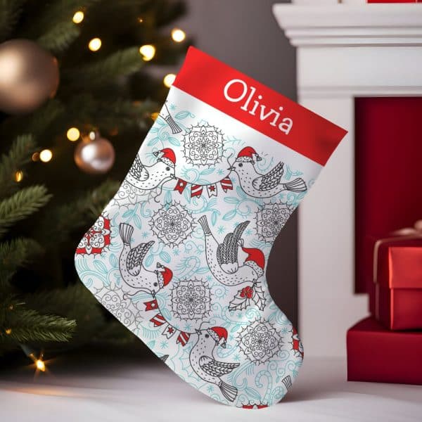 Personalized Christmas Stocking With A Teal And White Bird Design, And The Name Olivia.