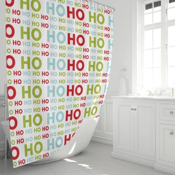 A Shower Curtain With A Repeating Pattern Of &Quot;Ho Ho Ho&Quot; In Red, Green, And Light Blue.