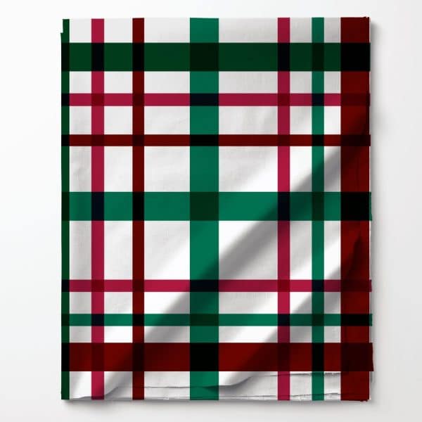 White Fabric With A Green, Red, And Black Plaid Pattern.