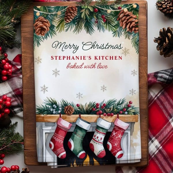 Christmas Tea Towel With A Fireplace And Stockings, Personalized With Stephanie'S Kitchen Baked With Love.