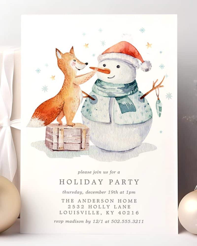 A holiday party invitation featuring a fox adding a carrot nose to a snowman.