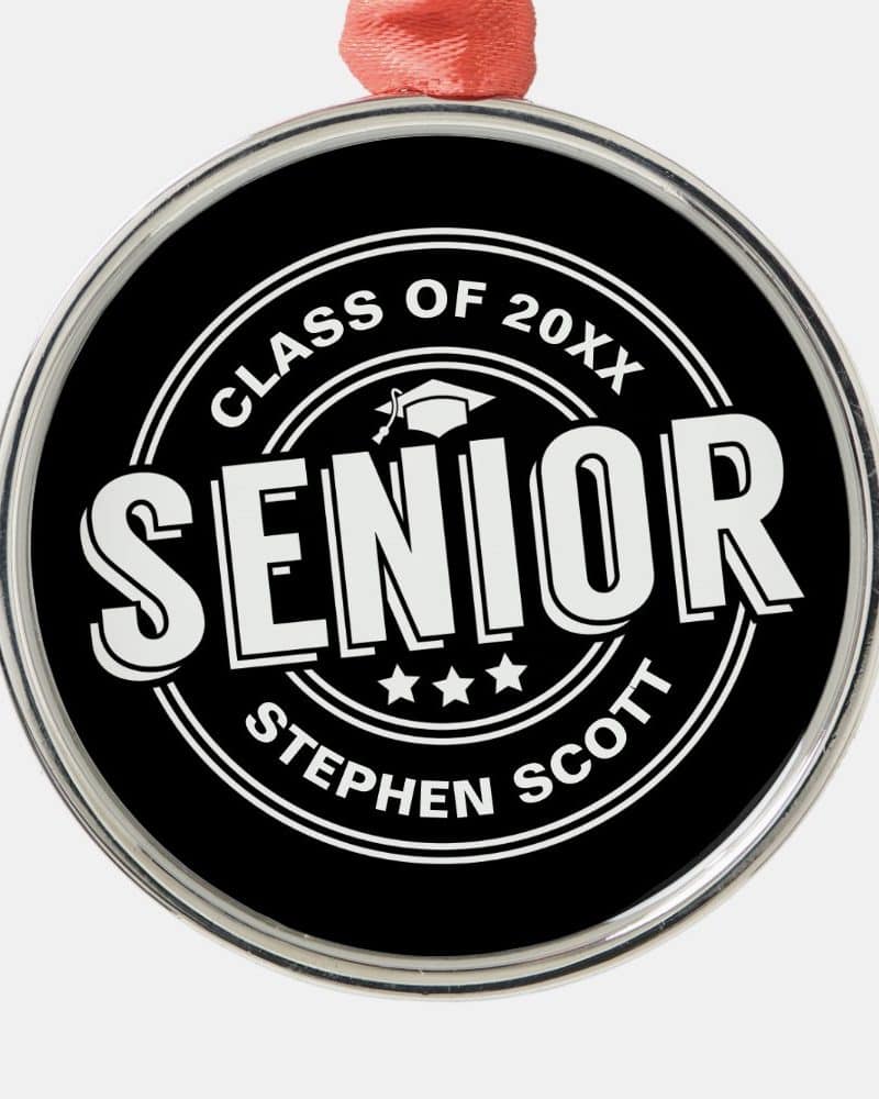 Black circular senior class of 20XX ornament with white lettering.