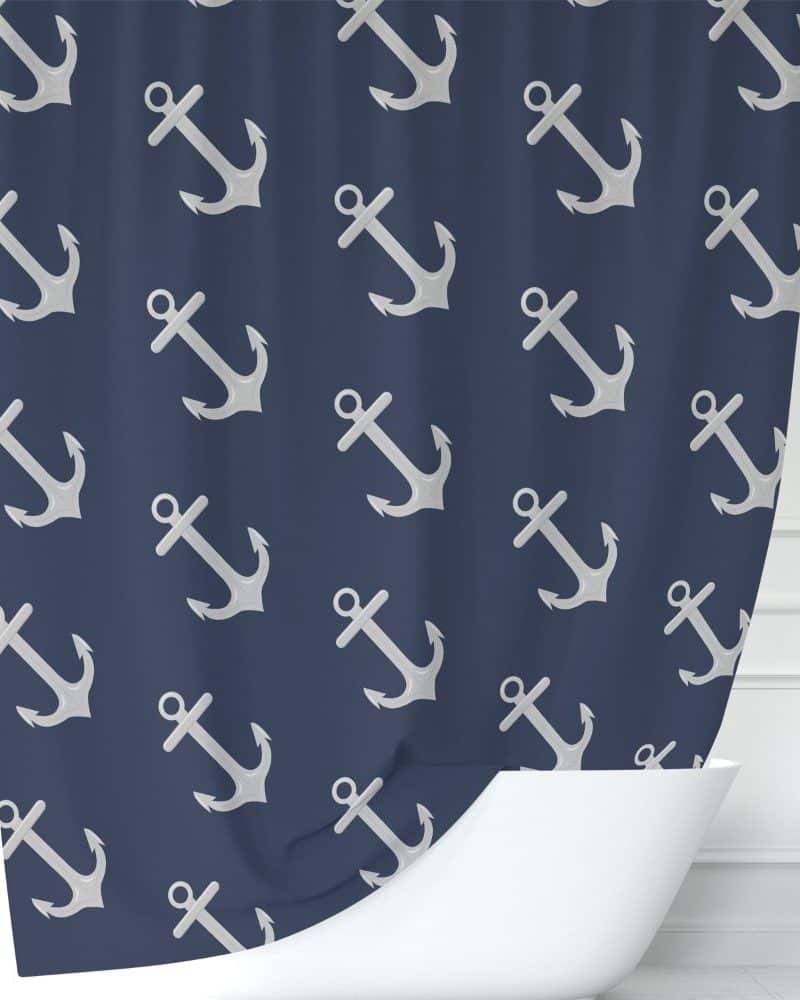 Navy blue shower curtain with a repeating pattern of light gray anchors.
