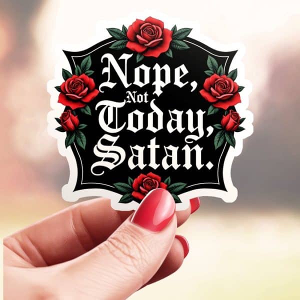 Hand Holding A Sticker That Says Nope, Not Today, Satan In A Gothic Style Font, Surrounded By Red Roses.