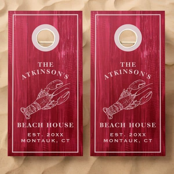 Two Red Wooden Cornhole Boards With A Lobster Illustration, &Quot;The Atkinsons Beach House Est. 20Xx Montauk, Ct&Quot; Text.