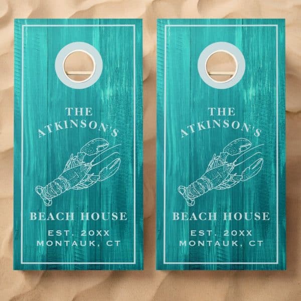 Two Teal Cornhole Boards With A Lobster And &Quot;The Atkinsons' Beach House, Est. 20Xx Montauk, Ct&Quot; Design.