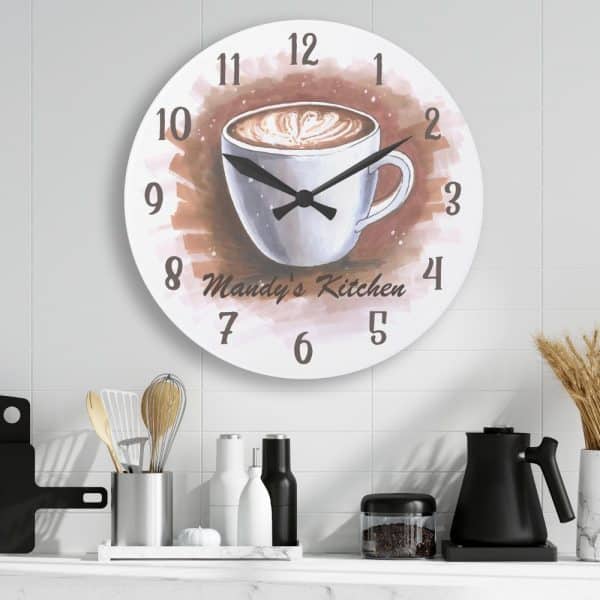 Round Kitchen Clock Featuring A Watercolor Illustration Of A Coffee Mug; Mandy'S Kitchen Is Inscribed Below The Mug.