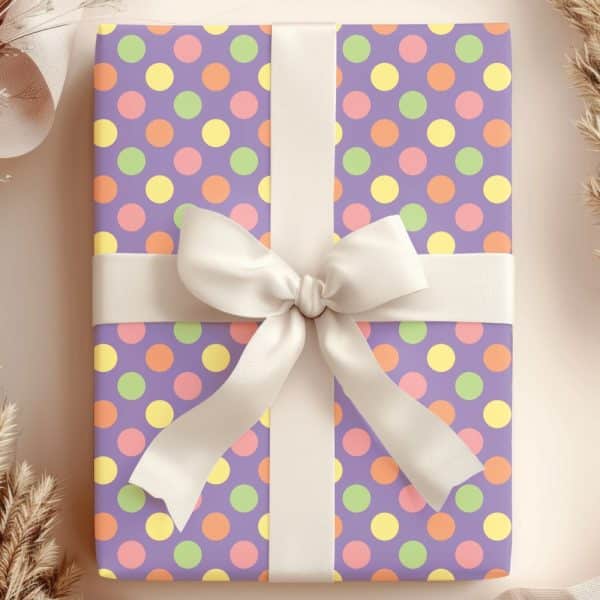 Purple Gift Box With Pastel Polka Dots And A Cream-Colored Ribbon.