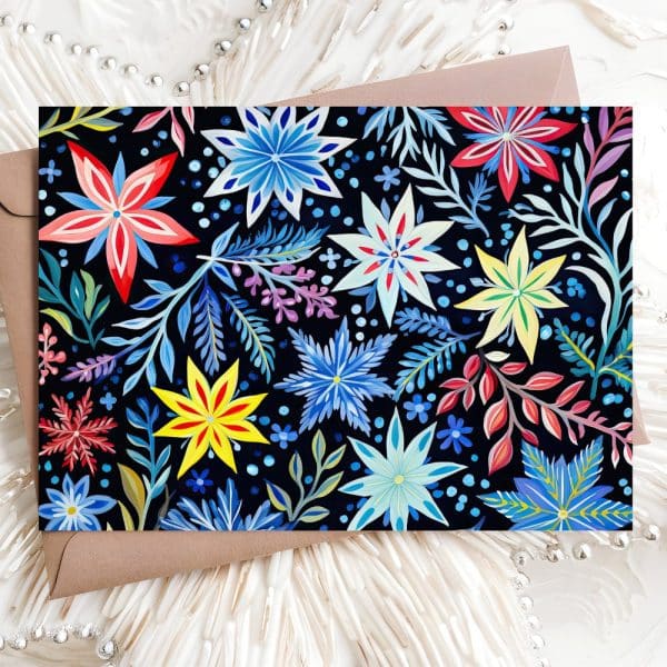 A Card Featuring A Vibrant Floral Pattern In Blues, Reds, And Yellows On A Dark Background.