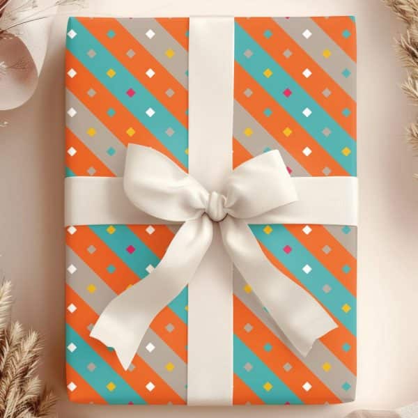 A Gift Box With Orange, Teal, And Gray Diagonal Stripes And A White Ribbon.
