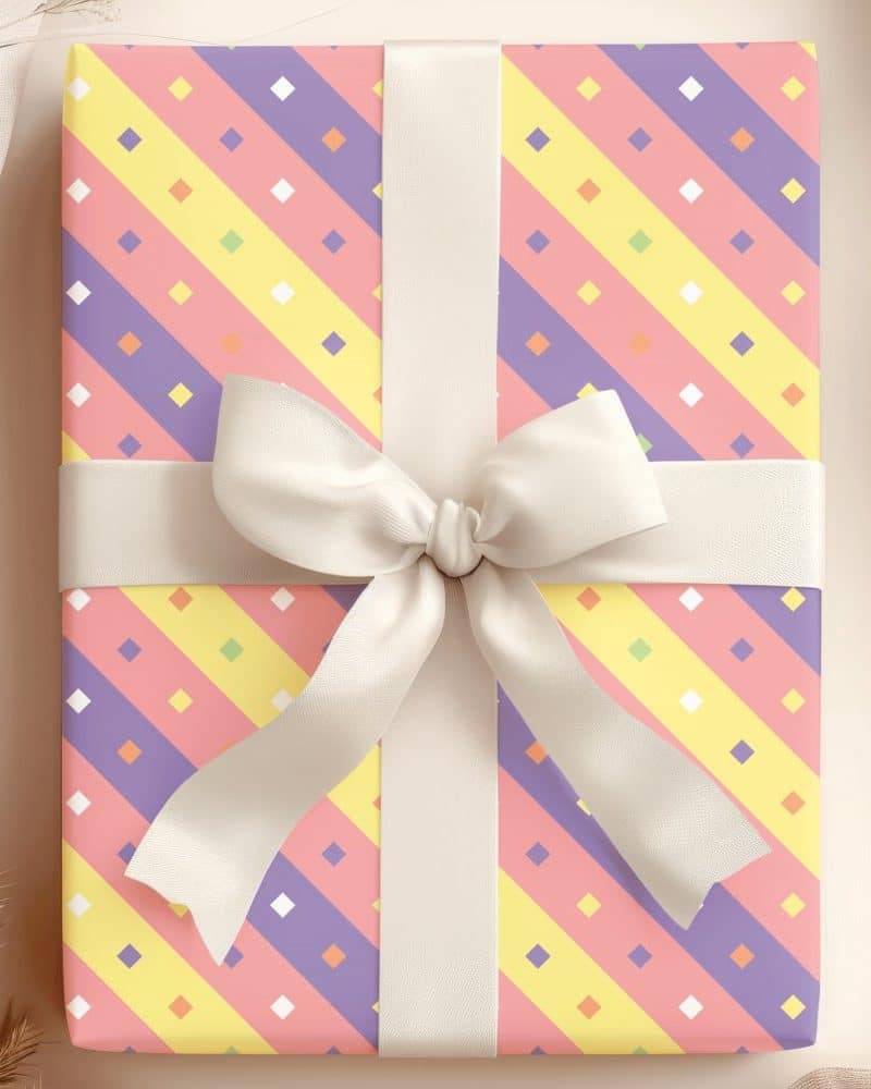 Pastel gift wrapped with a diagonally striped pattern and a cream-colored bow.