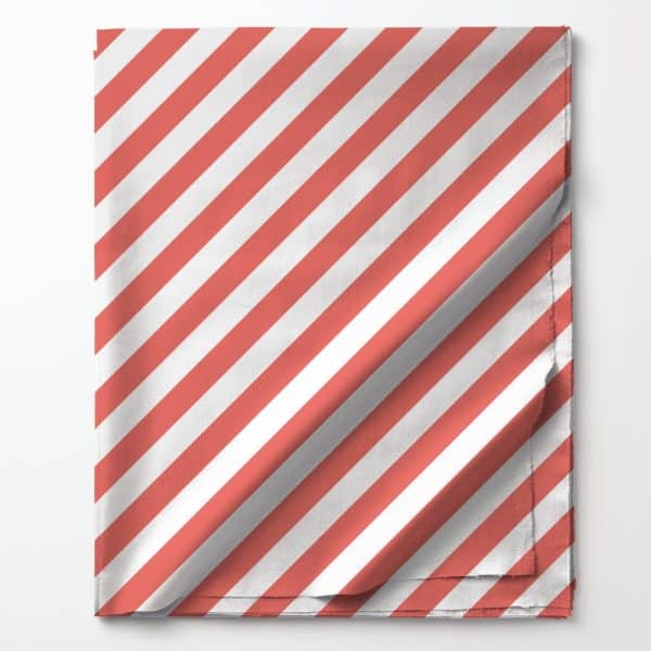 Coral And White Diagonal Striped Fabric Folded On A White Background.