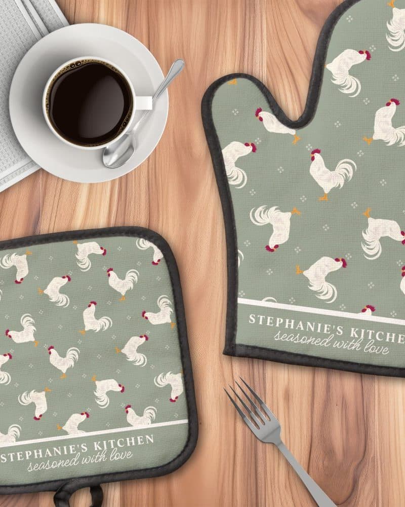 Personalized oven mitt and pot holder set with a sage green rooster pattern.