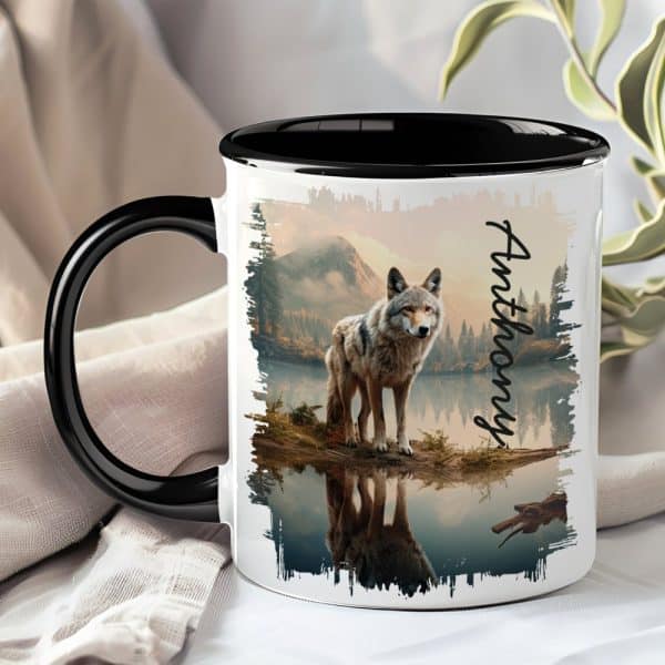 Black-Handled Mug With A Wolf Reflected In A Calm Lake, Mountains In The Background, And The Name Anthony.