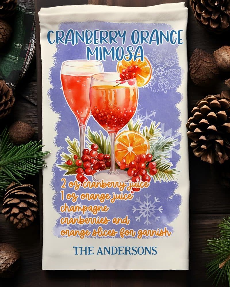 Tea towel design featuring two glasses of cranberry orange mimosas with recipe.
