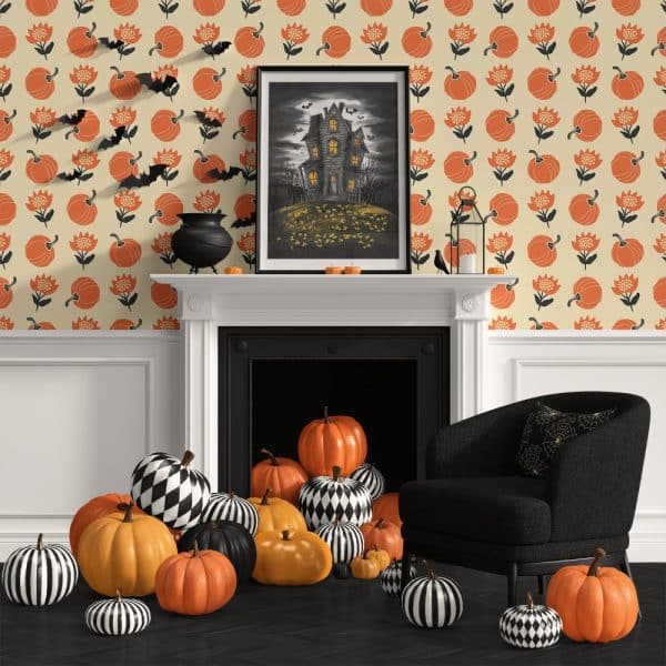 A Pile Of Orange And Black And White Pumpkins Sits In Front Of A Fireplace With A Halloween-Themed Illustration Above It.