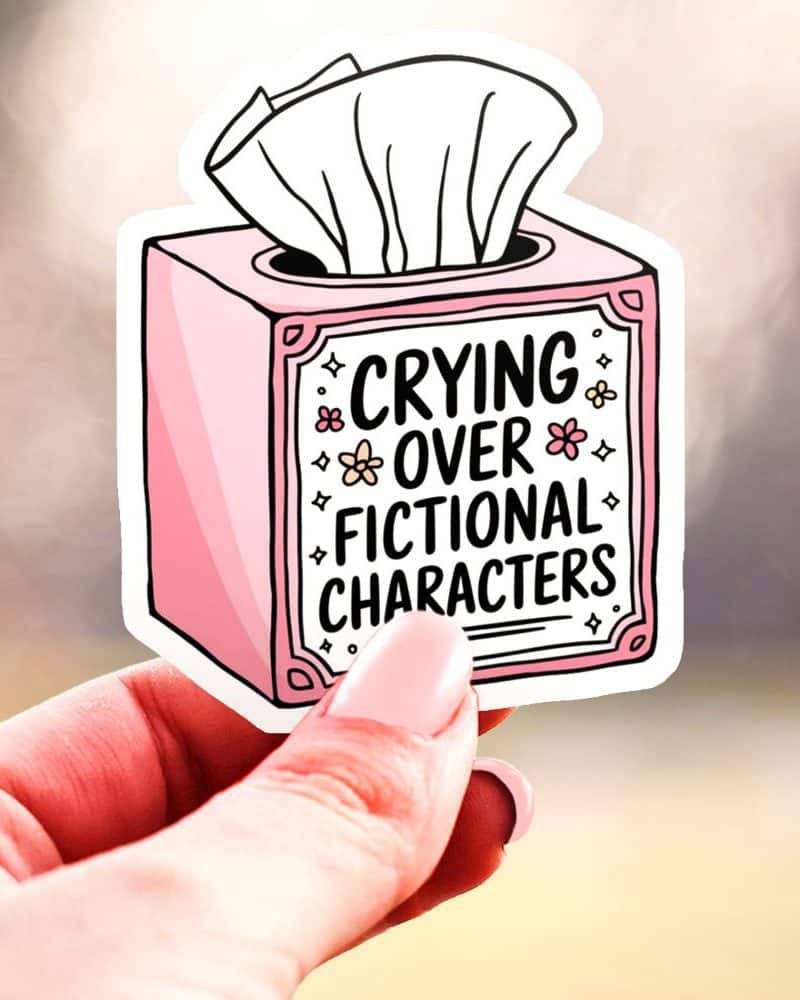 Pink tissue box sticker that says Crying Over Fictional Characters.