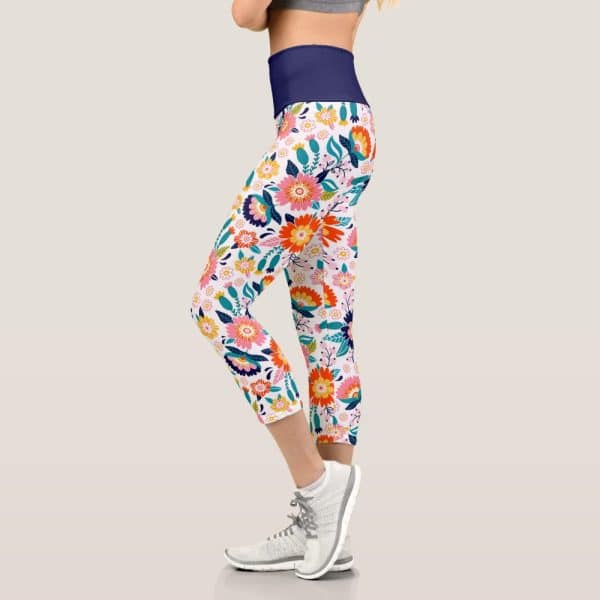 Woman'S Cropped Leggings With A Colorful Floral Pattern.