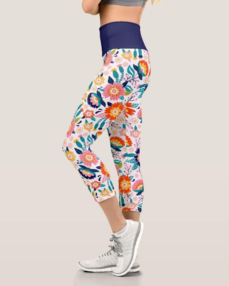 Woman's cropped leggings with a colorful floral pattern.