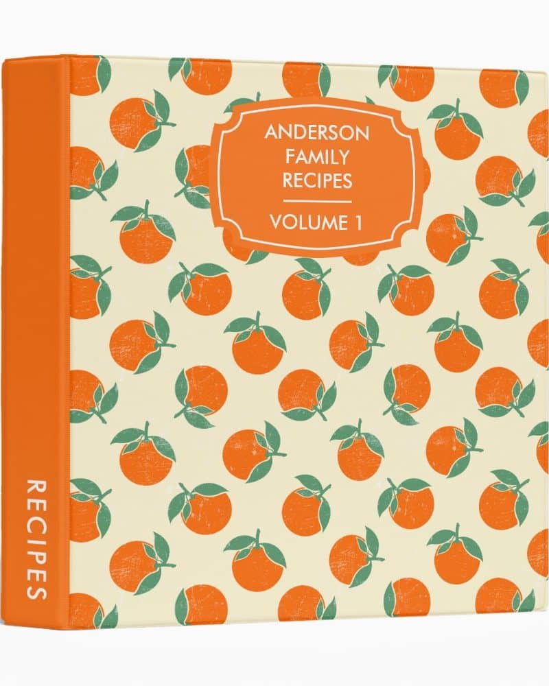 Orange recipe binder labeled Anderson Family Recipes, Volume 1.