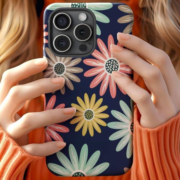 Hands Holding A Phone In A Floral Phone Case.