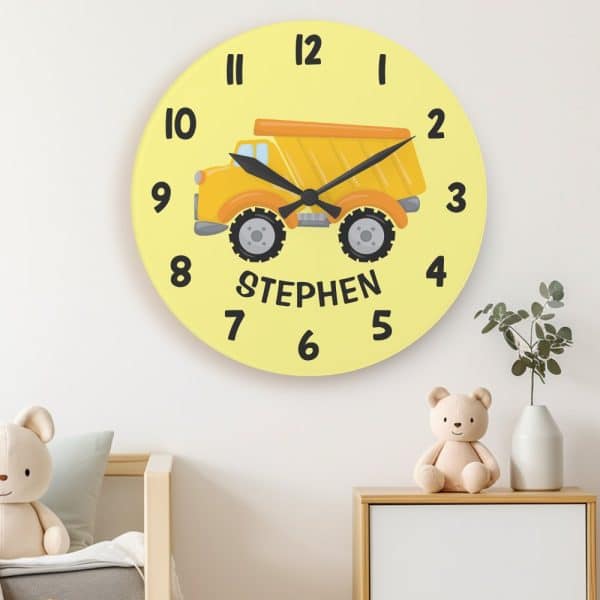 Yellow Children'S Clock Featuring A Cartoon Dump Truck And The Name Stephen.