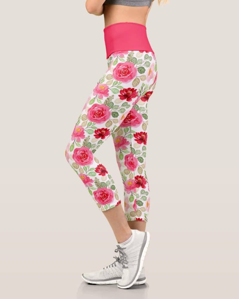 Woman's cropped leggings with a pink rose floral print.