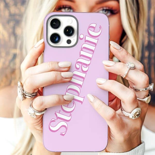 Woman'S Hands Holding A Light Purple Phone Case With The Name Stephanie Printed On It.
