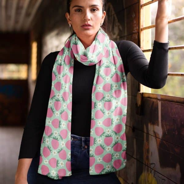 Woman Wearing A Light Green Strawberry Print Scarf.