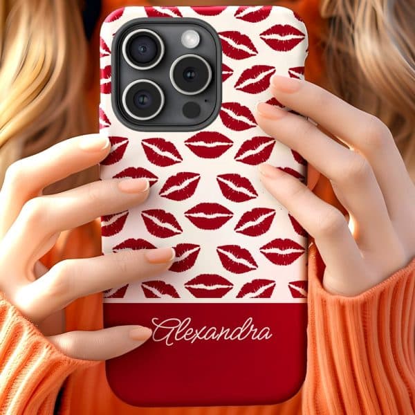 A Woman'S Hands Hold A Phone Case With A Red Lipstick Print And The Name Alexandra.